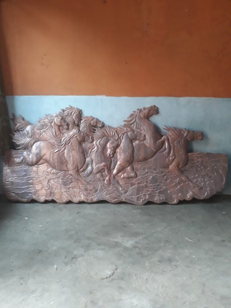 pengrajin relief