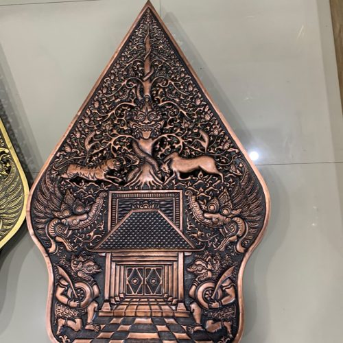 Gunungan wayang tembaga